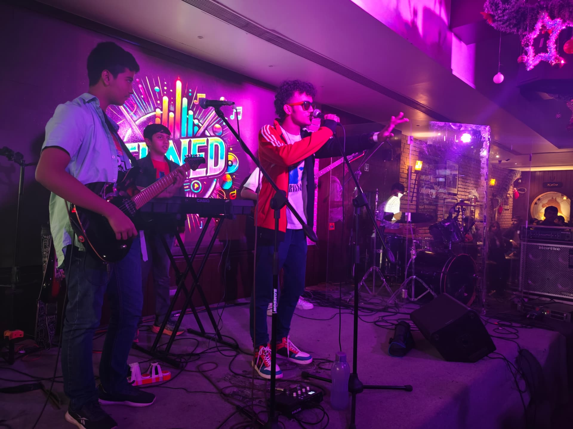 Revolution Music student band performing live on stage
