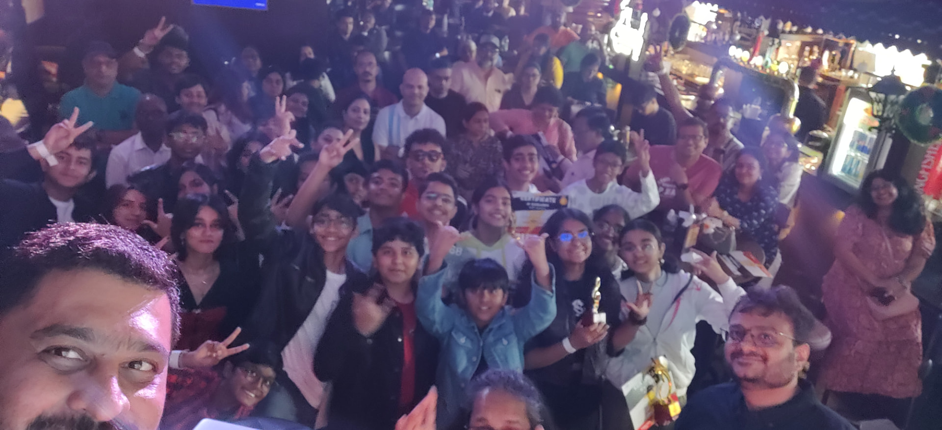 Revolution Music students and families celebrating a music event